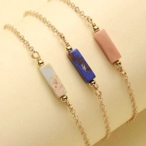 SET of THREE gold stone bracelets